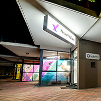Nighttime image of storefront